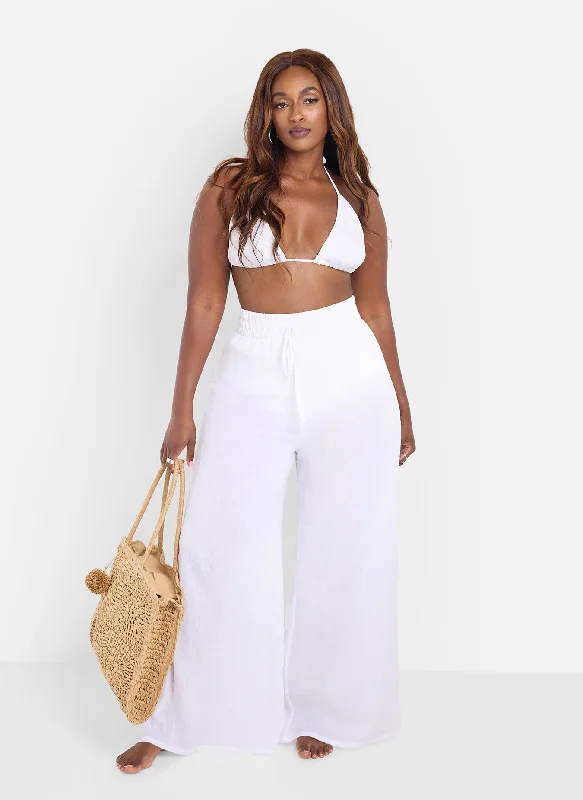 Ruched women swimwear with fabric gathers for a slimming effectIvory Gauze Sheer Wide Leg Coverup Pants