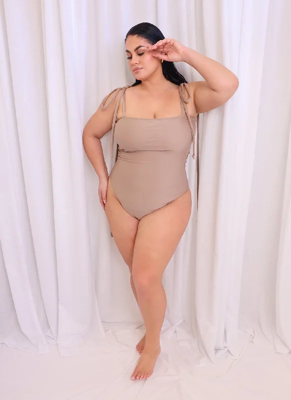 Ruched women swimwear with fabric gathers for a slimming effectCapri Tie Strap Swimsuit - Taupe