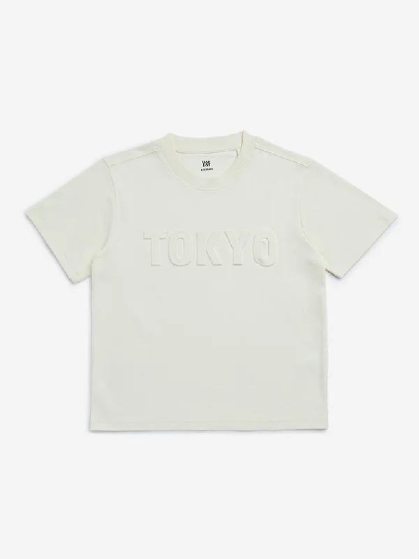 Embroidered Women T Shirt with Intricate DetailsY&F Kids Off-White Text Embossed Cotton T-Shirt