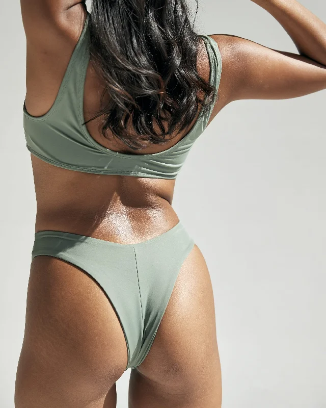 String bikini for a minimalistic and sexy beach styleCheeky Surf Bottom in Sage Green